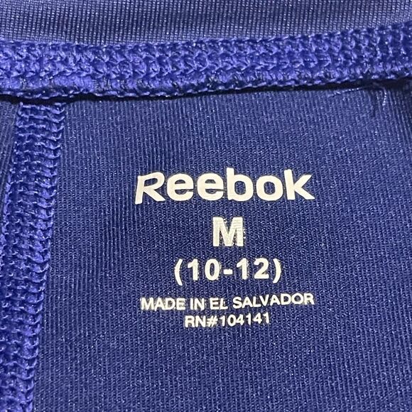 Reebok
- Girls purple / neon yellow spandex shorts - Picture 6 of 6